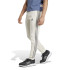 Pantalons adidas Homme Essentials Fleece Poignets fuselés 3 bandes Beige