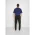 Pantalon Champion Homme Pantalon à ourlet droit Noir
