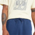 Pantalons New Balance Jogger graphique en polaire Sport Essentials Homme